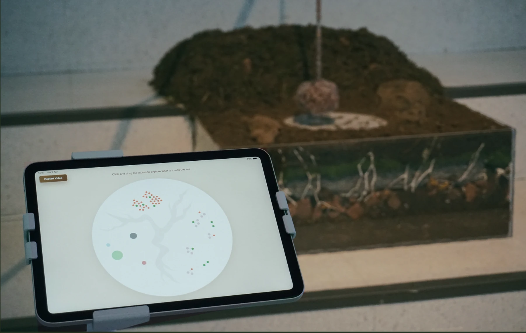 Final LOOK DOWN installation with an interpretation interface displayed on a tablet